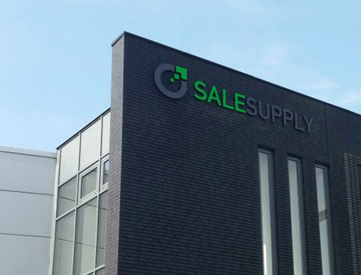 Frontside of office building with Salesupply logo