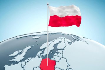 Polish flag pinned in the Poland on a map of Europe