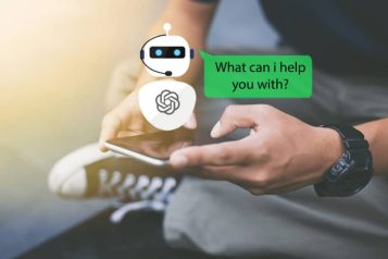 Person holding a mobile phone with a chat bot and a green message