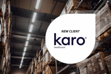 White Salesupply logo displaying the text "New Client" and underneath the Karo Healthcare logo with a warehhouse background